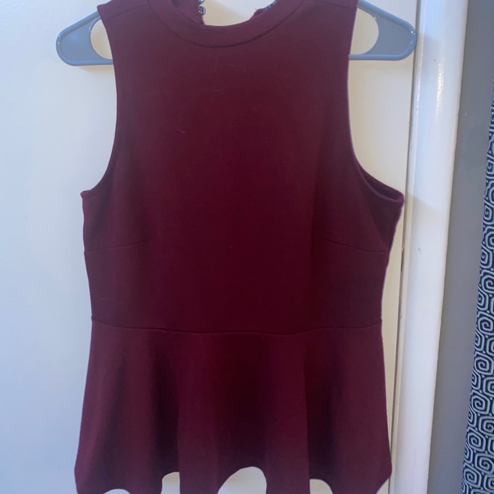 Maroon blouse.
